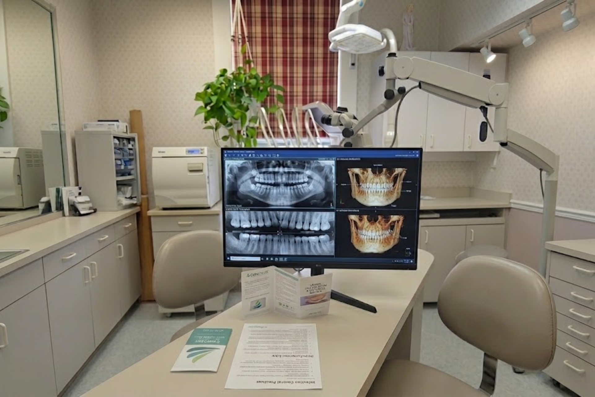 High-Resolution Digital Dental Radiography & 3D Imaging A professional dental workstation in Shelton, CT, displaying high-resolution digital X-rays and 3D jaw reconstructions for precise treatment planning.